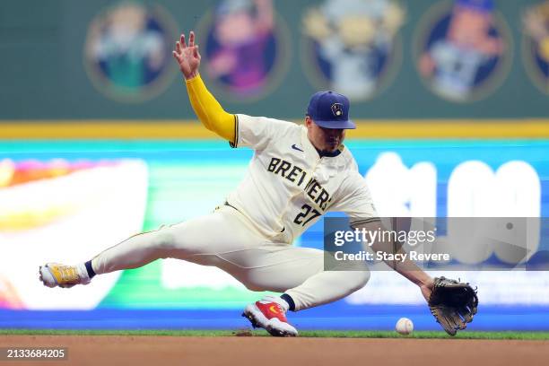 Willy Adames of the Milwaukee Brewers fields a ground ball during the first inning of the home opener against the Minnesota Twins at American Family...