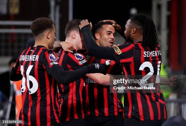 Justin Kluivert of AFC Bournemouth celebrates scoring his team's first goal with teammates during the Premier League match between AFC Bournemouth...