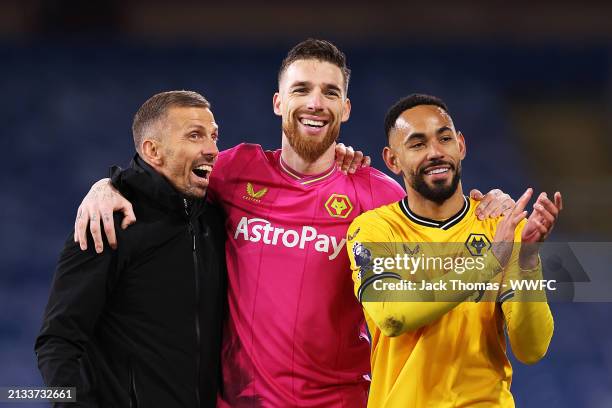 Gary O'Neil, Jose Sa and Matheus Cunha of Wolverhampton Wanderers acknowledge the fans after the draw during the Premier League match between Burnley...