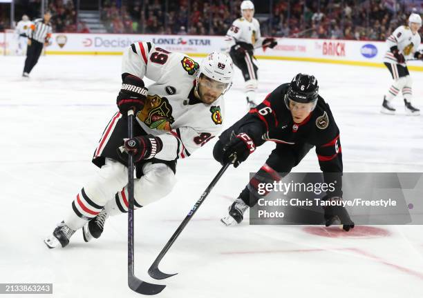 Andreas Athanasiou of the Chicago Blackhawks skates against the Ottawa Senators at Canadian Tire Centre on March 28, 2024 in Ottawa, Ontario.