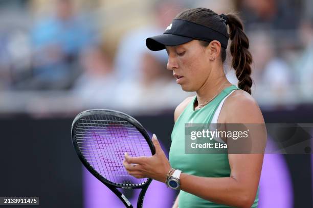 Jessica Pegula of the United States reacts in the first set against Amanda Anisimova of the United States on Day 2 of the WTA 500 Credit One...
