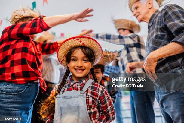 portrait of a girl dancing on a brazilian junina party - festa junina imagens e fotografias de stock