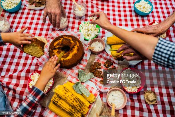 high angle view of a meal on a brazilian junina party - festa junina stock pictures, royalty-free photos & images