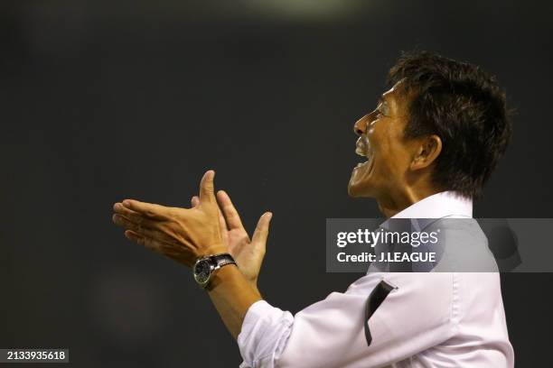 Head coach Hiroshi Jofuku of Sanfrecce Hiroshima celebrates the team's fourth goal during the J.League J1 match between Sanfrecce Hiroshima and Gamba...