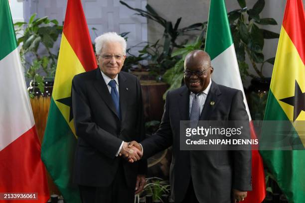 Italian President Sergio Mattarella shakes hands with Ghanaian President Nana Addo Dankwa Akufo-Addo after their meeting at the Jubilee House in...