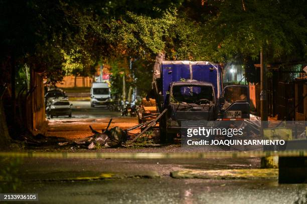 View of a truck believed to have been used to launch and detonate explosives on a street next to the Colombian Army Third Brigade Miliatry...