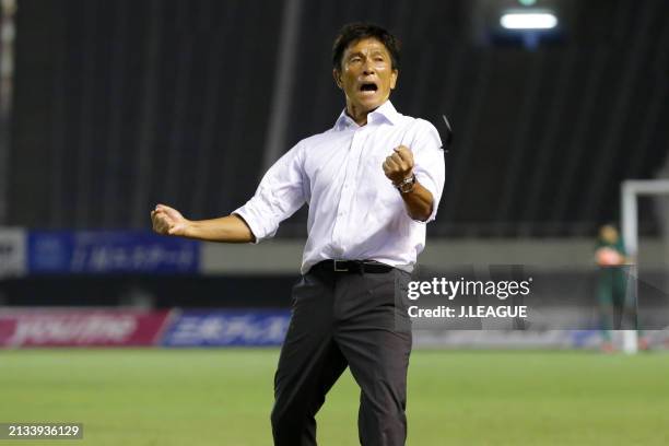 Head coach Hiroshi Jofuku of Sanfrecce Hiroshima celebrates the team's 4-0 victory in the J.League J1 match between Sanfrecce Hiroshima and Gamba...