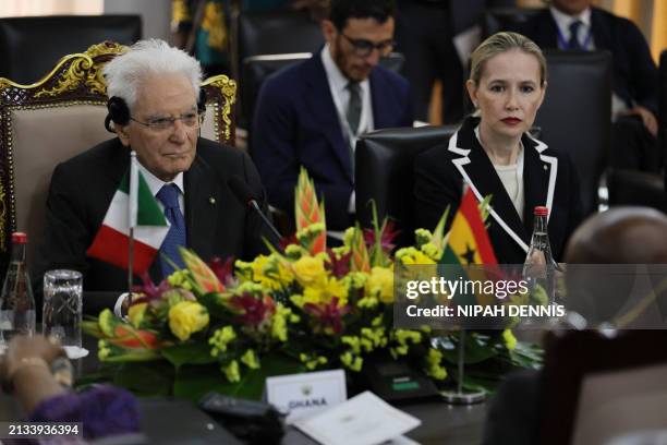 Italian President Sergio Mattarella listens to Ghanaian President Nana Addo Dankwa Akufo-Addo during their bilateral meeting at the Jubilee House in...