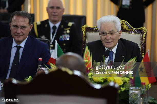Italian President Sergio Mattarella motions as he listens to Ghanaian President Nana Addo Dankwa Akufo-Addo during their bilateral meeting at the...