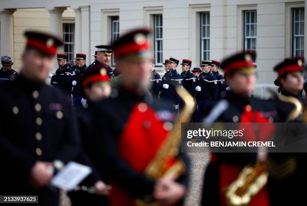 Members of France's Gendarmerie Garde Republicaine and and members of the British Army's Band of the Grenadier Guards take part in a rehearsal for a...