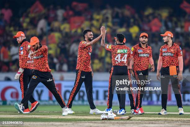 Sunrisers Hyderabad's Jaydev Unadkat celebrates with teammates after taking the wicket of Chennai Super Kings' Ajinkya Rahane during the Indian...