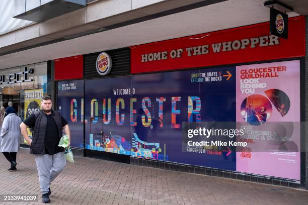 Welcome to Gloucester hoarding on the exterior of the closed down Burger King fast food restaurant, another example of the decline of the UK high...