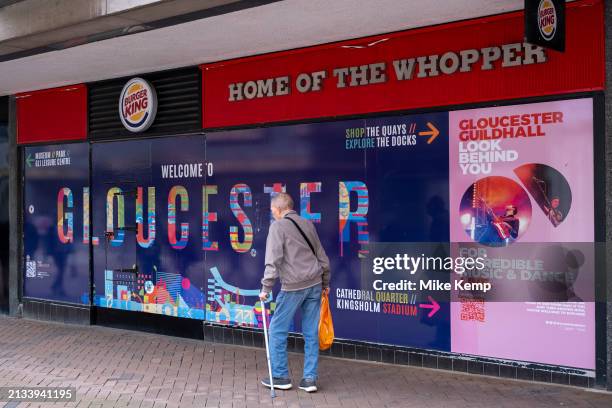 Welcome to Gloucester hoarding on the exterior of the closed down Burger King fast food restaurant, another example of the decline of the UK high...