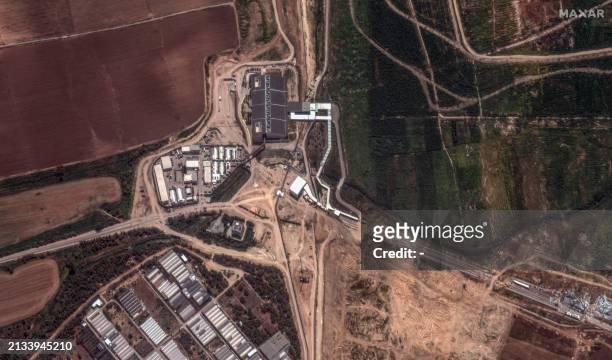 This handout satellite image collected and released by Maxar Technologies on April 5 shows the Erez border crossing between southern Israel and the...