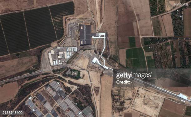 This handout satellite image released by Maxar Technologies on April 5, 2024 and dated September 18 shows the Erez border crossing between southern...