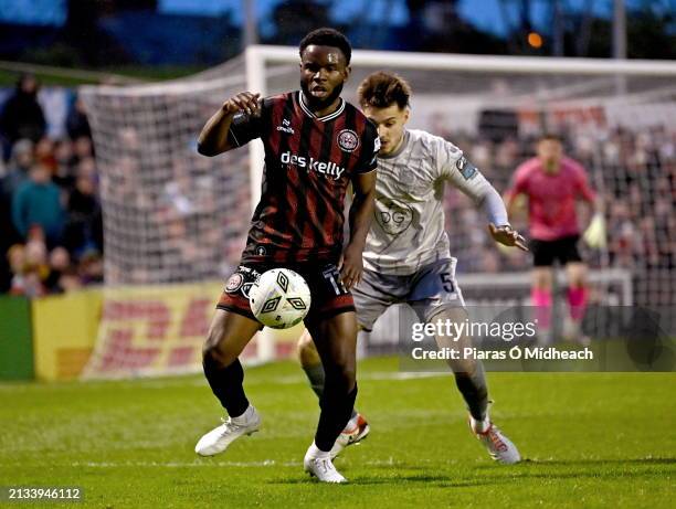 Dublin , Ireland - 5 April 2024; James Akintunde of Bohemians in action against Grant Horton of Waterford during the SSE Airtricity Men's Premier...