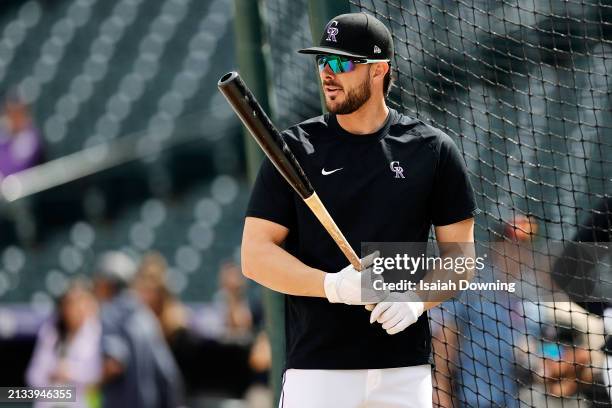 Kris Bryant of the Colorado Rockies takes batting practice prior to the game between the Tampa Bay Rays and the Colorado Rockies at Coors Field on...