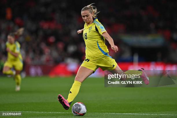 Sweden's forward Fridolina Rolfo shoots towards goal during the Women's UEFA Euro 2025 League A group 3 qualifying football match between England and...