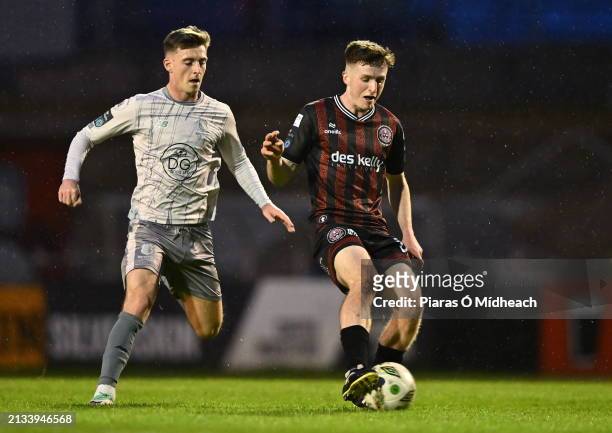 Dublin , Ireland - 5 April 2024; James McManus of Bohemians in action against Ben McCormack of Waterford during the SSE Airtricity Men's Premier...