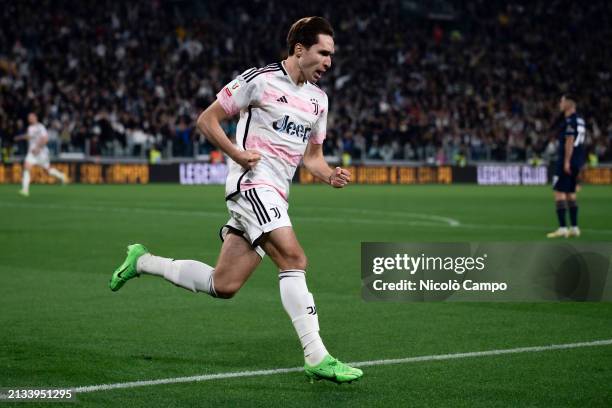 Federico Chiesa of Juventus FC celebrates after scoring the opening goal during the Coppa Italia semi final first leg football match between Juventus...