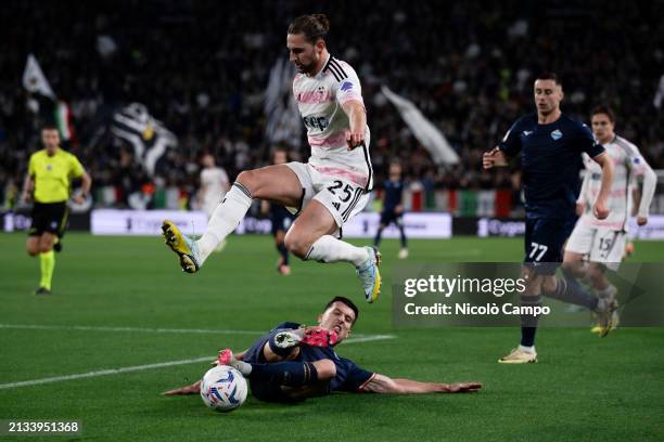 Adrien Rabiot of Juventus FC is tackled by Nicolo Casale of SS Lazio during the Coppa Italia semi final first leg football match between Juventus FC...