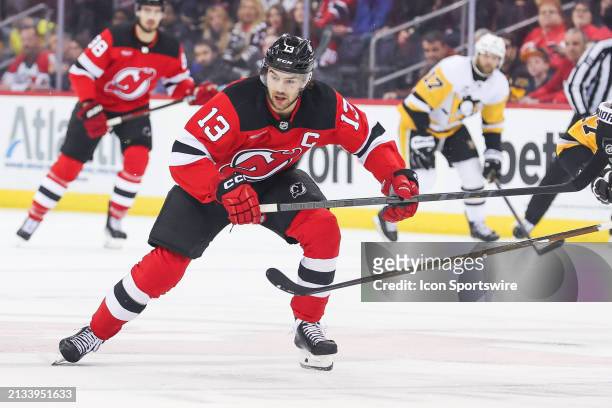 New Jersey Devils center Nico Hischier skates during a game between the Pittsburgh Penguins and New Jersey Devils on April 2, 2024 at Prudential...