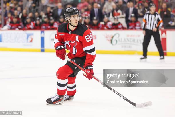 New Jersey Devils center Jack Hughes skates during a game between the Pittsburgh Penguins and New Jersey Devils on April 2, 2024 at Prudential Center...