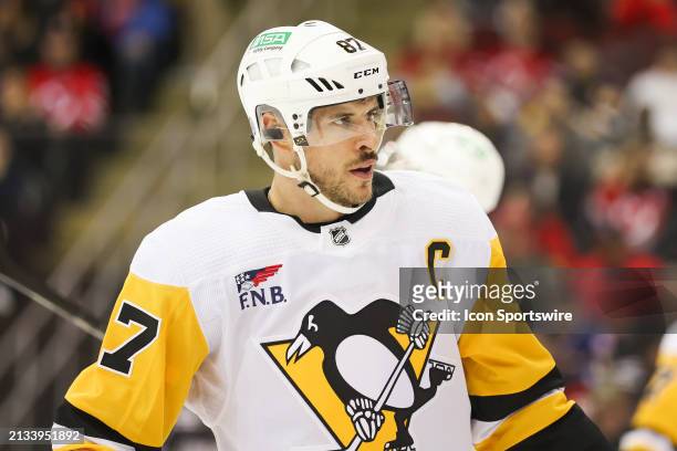 Pittsburgh Penguins center Sidney Crosby looks on during a game between the Pittsburgh Penguins and New Jersey Devils on April 2, 2024 at Prudential...