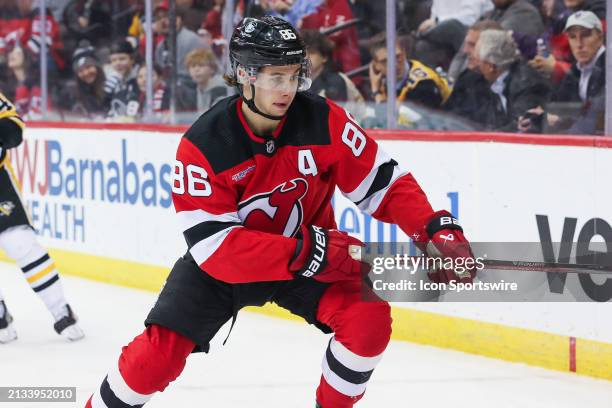 New Jersey Devils center Jack Hughes skates during a game between the Pittsburgh Penguins and New Jersey Devils on April 2, 2024 at Prudential Center...