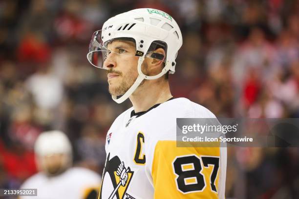 Pittsburgh Penguins center Sidney Crosby looks on during a game between the Pittsburgh Penguins and New Jersey Devils on April 2, 2024 at Prudential...