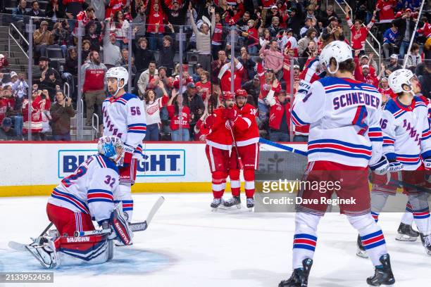 Andrew Copp of the Detroit Red Wings celebrates his goal on Jonathan Quick of the New York Rangers with teammate Joe Veleno during the first period...