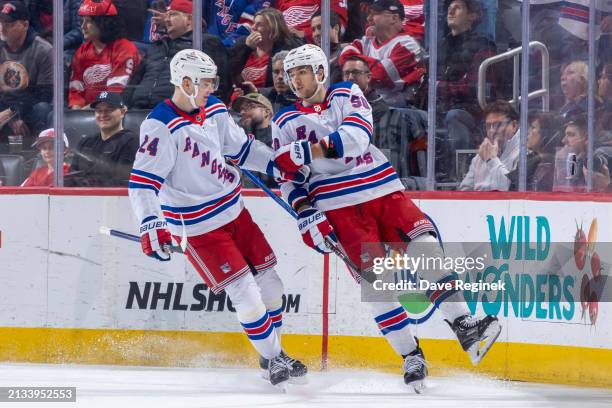 Will Cuylle of the New York Rangers celebrates his goal against the Detroit Red Wings with Kaapo Kakko during the first period at Little Caesars...