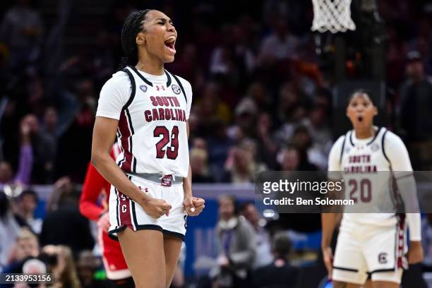 Bree Hall of the South Carolina Gamecocks celebrates against the NC State Wolfpack during the NCAA Women's Basketball Tournament Final Four semifinal...