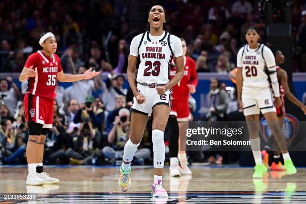 Bree Hall of the South Carolina Gamecocks celebrates against the NC State Wolfpack during the NCAA Women's Basketball Tournament Final Four semifinal...