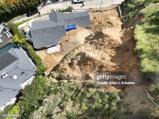 Hollywood Hills, CA An aerial view where recent heavy rains led to a hillside collapsing at about 5:30 p.m. Wednesday, on top of and into a home on...