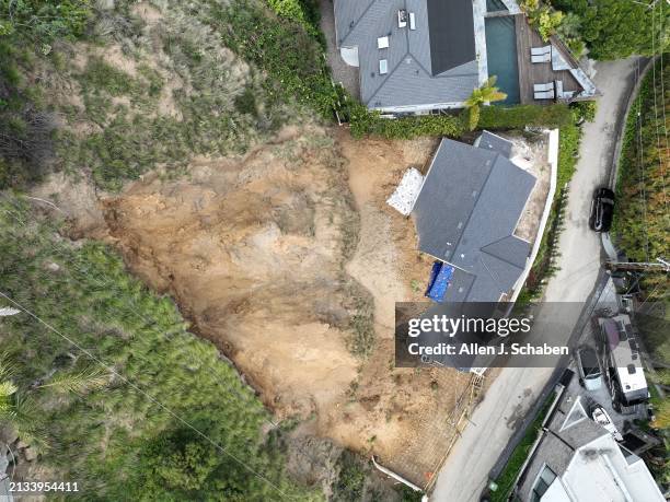 Hollywood Hills, CA An aerial view where recent heavy rains led to a hillside collapsing at about 5:30 p.m. Wednesday, on top of and into a home on...