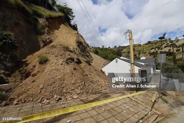 Hollywood Hills, CA A view where recent heavy rains led to a hillside collapsing at about 5:30 p.m. Wednesday, on top of and into a home on Sunset...