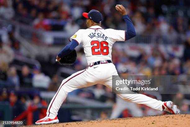 Raisel Iglesias of the Atlanta Braves pitches in the ninth inning during the game between the Arizona Diamondbacks and the Atlanta Braves at Truist...