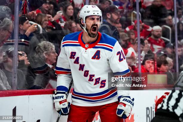 Chris Kreider of the New York Rangers reacts after scoring a goal against the Detroit Red Wings during the third period at Little Caesars Arena on...