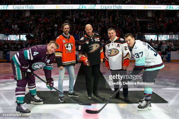 Cam Fowler of the Anaheim Ducks, Ryan Miller, Ryan Getzlaf, Francois Beauchemin and Yanni Gourde of the Seattle Kraken pose for a photo during the...