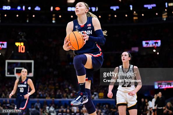 Paige Bueckers of the UConn Huskies shoots a layup against the Iowa ...