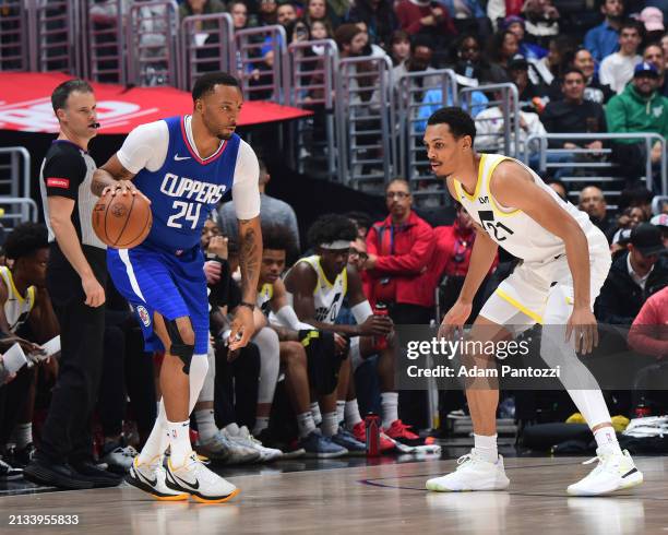 Darius Bazley of the Utah Jazz plays defense during the game against Norman Powell of the LA Clippers on April 5, 2024 at Crypto.Com Arena in Los...