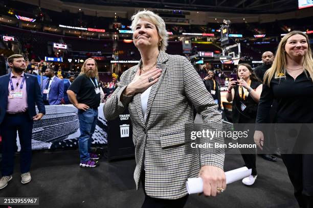 Head coach Lisa Bluder of the Iowa Hawkeyes walks off the court after the game against the UConn Huskies during the NCAA Women's Basketball...