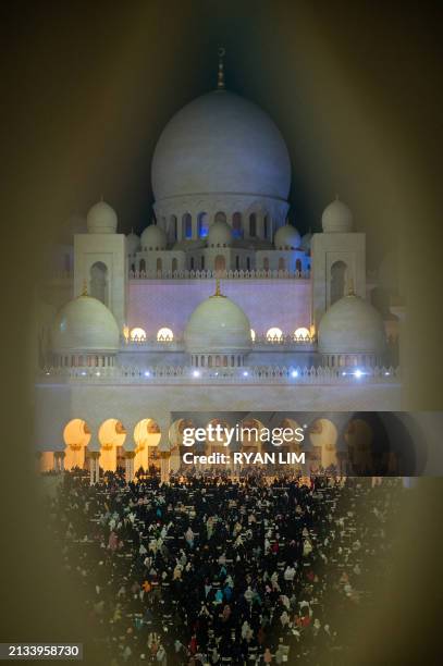 Women pray at the Sheikh Zayed Grand Mosque in Abu Dhabi in the early hours of April 6 on Laylat al-Qadr , one of the holiest nights during the...