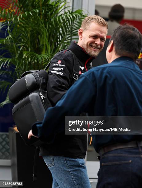 Kevin Magnussen of Denmark and MoneyGram Haas F1 Team arrives in the paddock before qualifying ahead of the F1 Grand Prix of Japan at Suzuka...