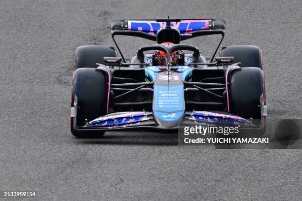 Alpine's French driver Esteban Ocon takes part in the qualifying session for the Formula One Japanese Grand Prix race at the Suzuka circuit in...