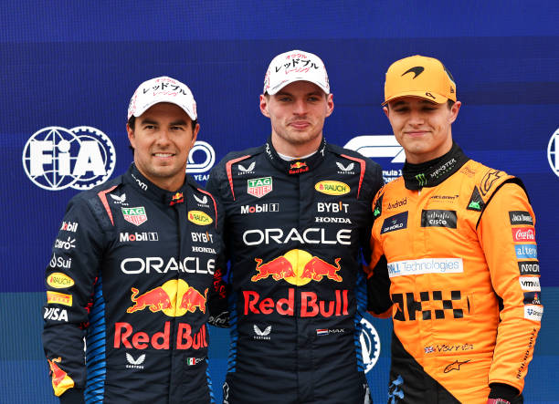 Sergio Perez of Mexico and Oracle Red Bull Racing, Max Verstappen of the Netherlands and Oracle Red Bull Racing and Lando Norris of Great Britain and...