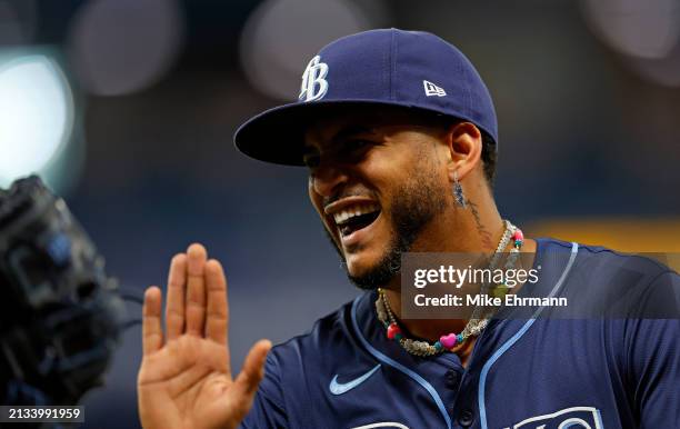 Jose Siri of the Tampa Bay Rays reacts to a play during a game against the Texas Rangers at Tropicana Field on April 02, 2024 in St Petersburg,...