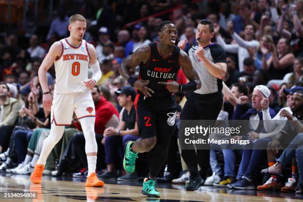 Terry Rozier of the Miami Heat reacts after making a three point basket against the New York Knicks during the second quarter of the game at Kaseya...