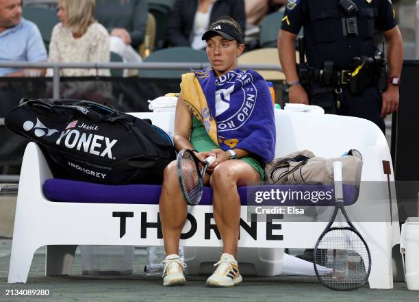 Jessica Pegula of the United States sits in between games in the third set against Amanda Anisimova of the United States on Day 2 of the WTA 500...
